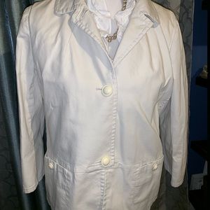 Cream color jacket. Feels like denim.